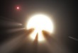 26nov2015---ilustracao-mostra-uma-estrela-atras-de-um-cometa-fragmentado-observacoes-sugerem-que-esse-seja-o-motivo-dos-misteriosos-padroes-de-luz-da-estrela-kic-8462852-1448536864426_615x300